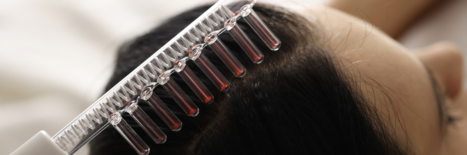 Woman Is Doing Hair Strengthening Procedures Closeup